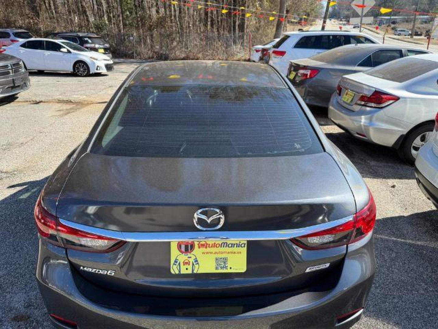 2015 Gray Mazda Mazda 6 i Sport (JM1GJ1U57F1) with an 2.5L I-4 DI DOHC engine, Automatic transmission, located at 1806 Veterans Memorial Hwy SW, Austell, GA, 30168, (770) 944-9558, 33.817959, -84.606987 - Photo#5