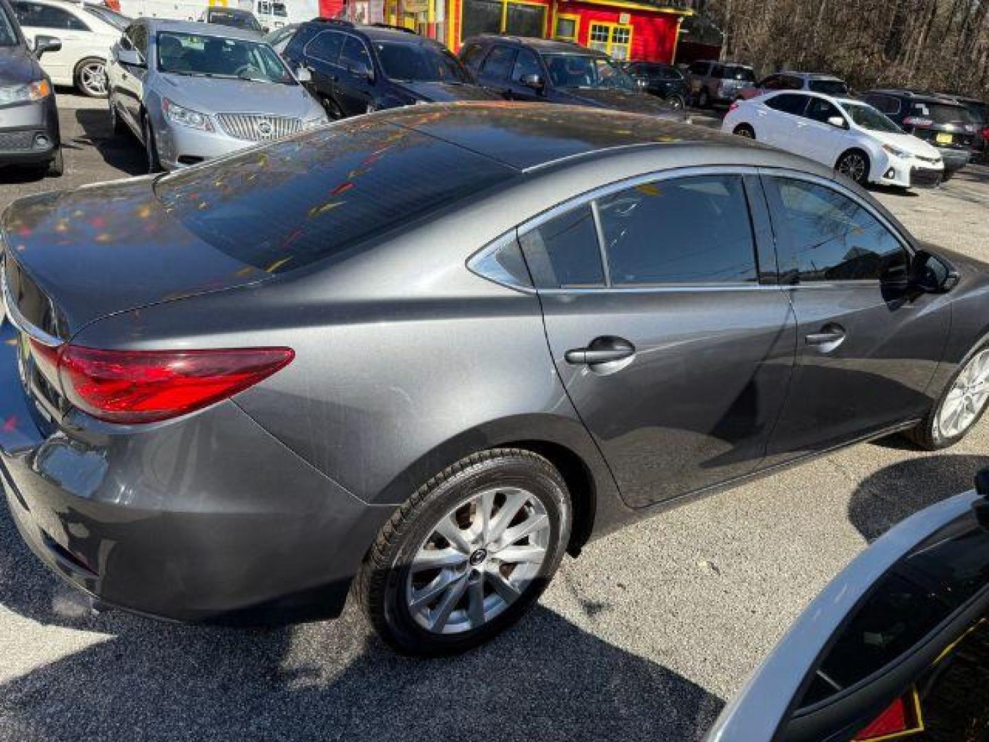 2015 Gray Mazda Mazda 6 i Sport (JM1GJ1U57F1) with an 2.5L I-4 DI DOHC engine, Automatic transmission, located at 1806 Veterans Memorial Hwy SW, Austell, GA, 30168, (770) 944-9558, 33.817959, -84.606987 - Photo#8