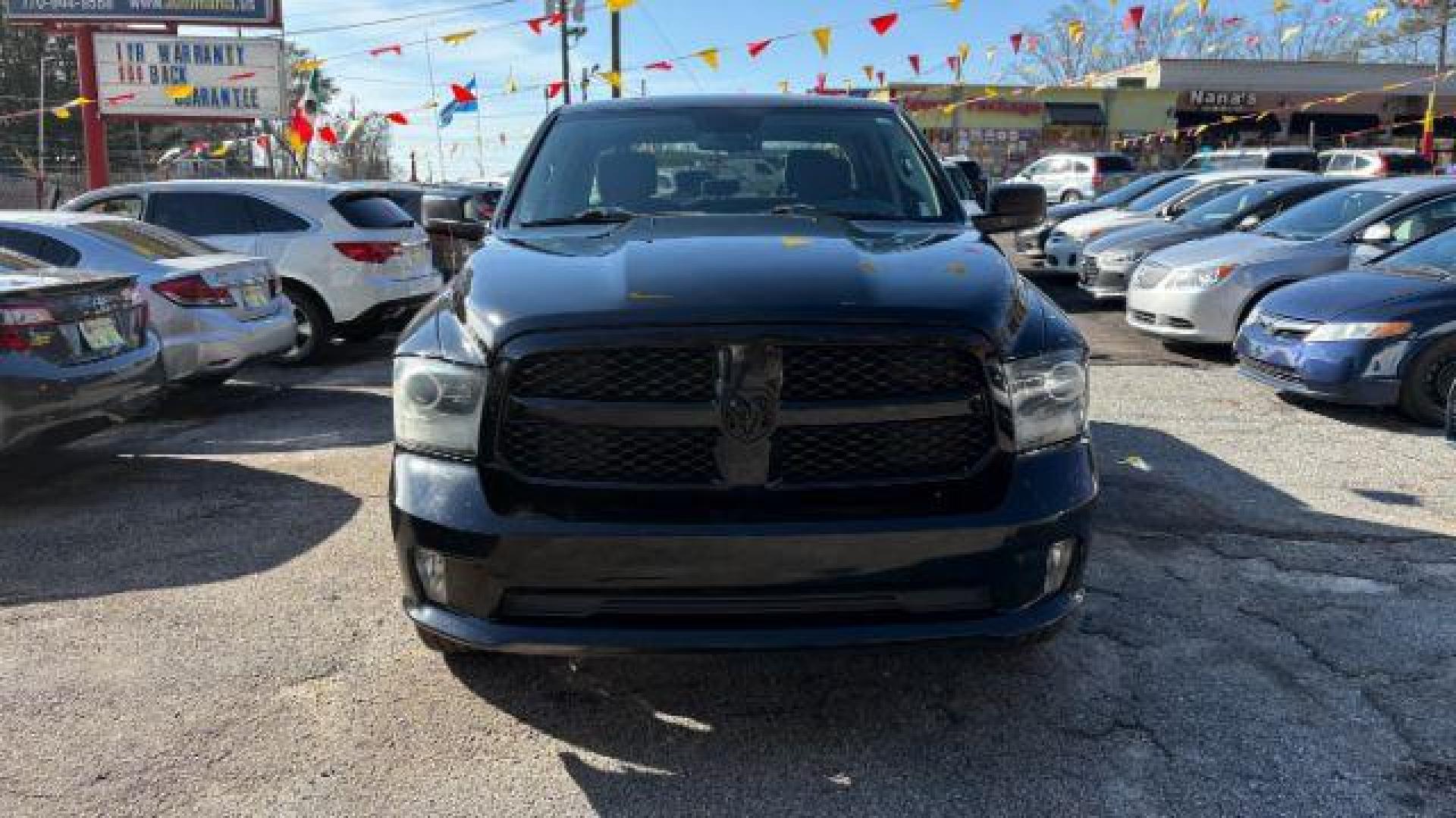 2014 Black RAM 1500 Tradesman/Express Crew Cab SWB 2WD (1C6RR6KT3ES) with an 5.7L V8 OHV 16V engine, 8-Speed Automatic transmission, located at 1806 Veterans Memorial Hwy SW, Austell, GA, 30168, (770) 944-9558, 33.817959, -84.606987 - Photo#1