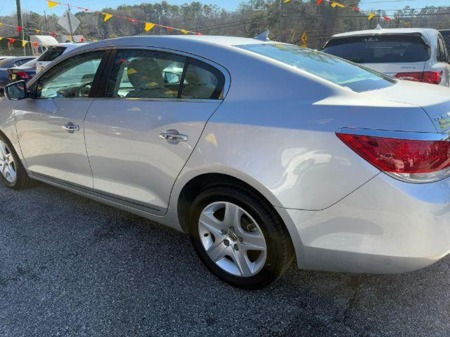 2010 Silver Buick LaCrosse CX (1G4GB5EGXAF) with an 3.0L V6 DOHC 24V engine, 6-Speed Automatic transmission, located at 1806 Veterans Memorial Hwy SW, Austell, GA, 30168, (770) 944-9558, 33.817959, -84.606987 - Photo#2