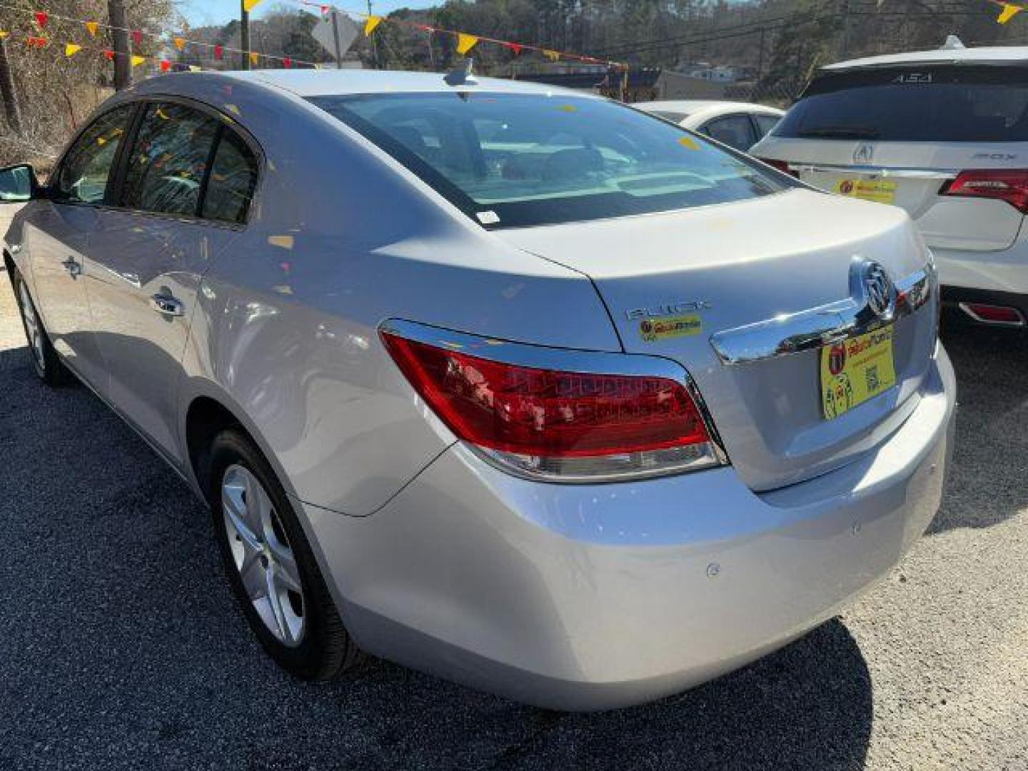 2010 Silver Buick LaCrosse CX (1G4GB5EGXAF) with an 3.0L V6 DOHC 24V engine, 6-Speed Automatic transmission, located at 1806 Veterans Memorial Hwy SW, Austell, GA, 30168, (770) 944-9558, 33.817959, -84.606987 - Photo#3