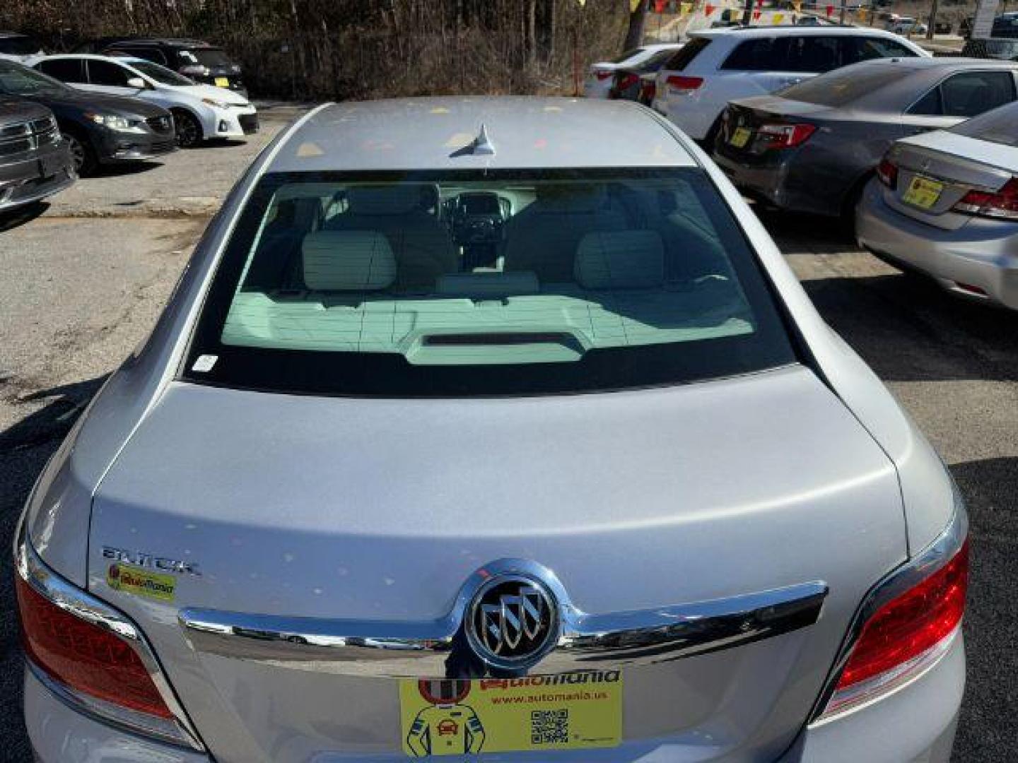 2010 Silver Buick LaCrosse CX (1G4GB5EGXAF) with an 3.0L V6 DOHC 24V engine, 6-Speed Automatic transmission, located at 1806 Veterans Memorial Hwy SW, Austell, GA, 30168, (770) 944-9558, 33.817959, -84.606987 - Photo#4