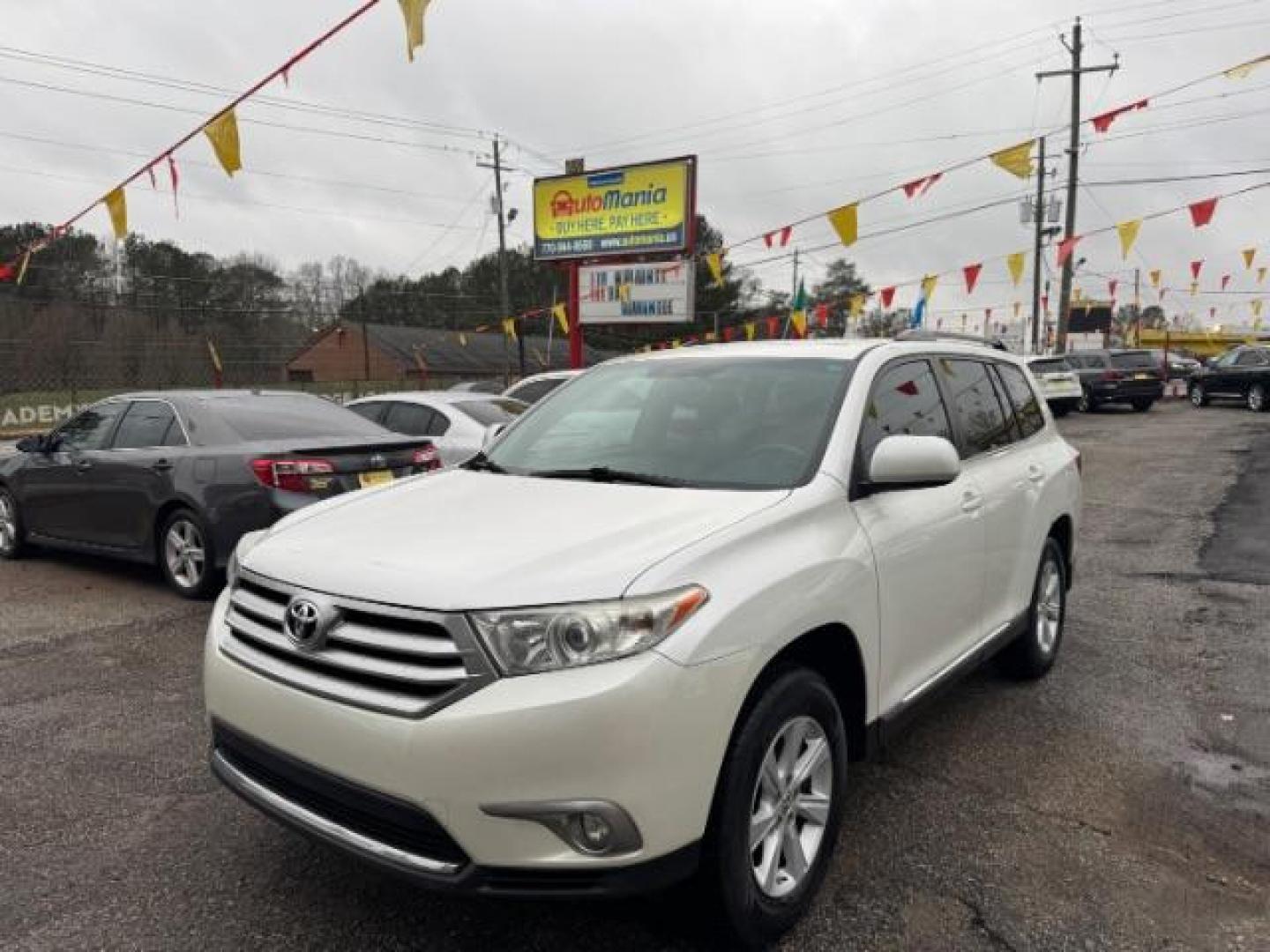 2012 White Toyota Highlander Base 2WD V6 (5TDZK3EH8CS) with an 3.5L V6 DOHC 24V engine, 5-Speed Automatic transmission, located at 1806 Veterans Memorial Hwy SW, Austell, GA, 30168, (770) 944-9558, 33.817959, -84.606987 - Photo#0