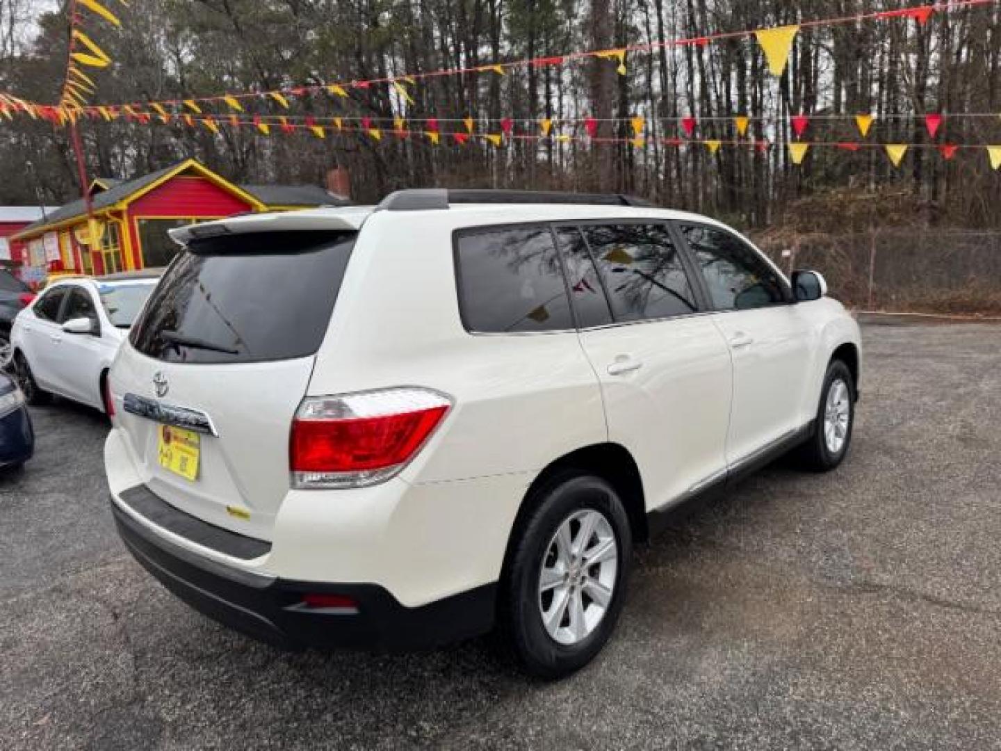 2012 White Toyota Highlander Base 2WD V6 (5TDZK3EH8CS) with an 3.5L V6 DOHC 24V engine, 5-Speed Automatic transmission, located at 1806 Veterans Memorial Hwy SW, Austell, GA, 30168, (770) 944-9558, 33.817959, -84.606987 - Photo#2