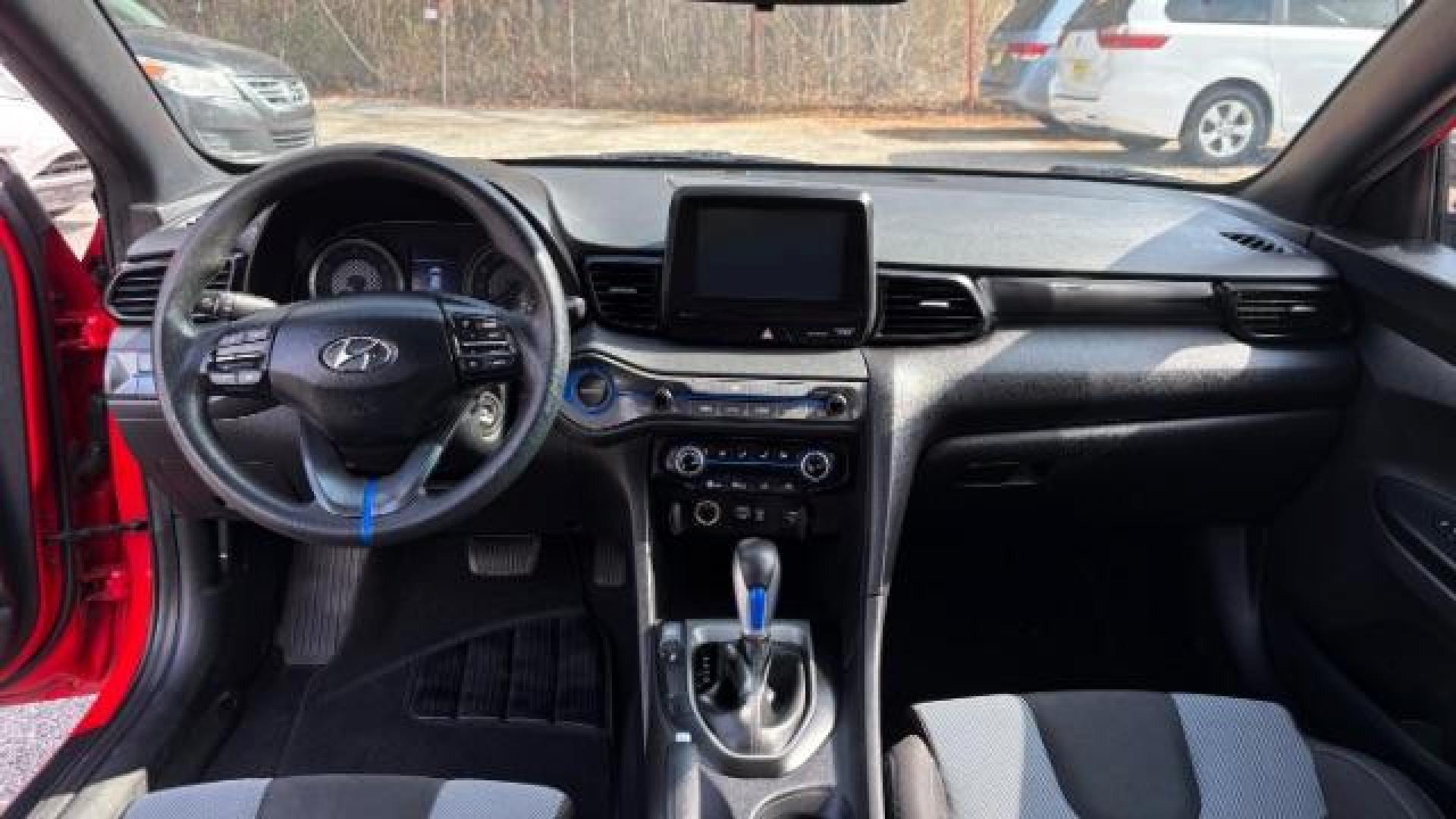 2019 Red Hyundai Veloster 2.0 6A (KMHTG6AF7KU) with an 2.0L L4 DOHC 16V engine, 6-Speed Automatic transmission, located at 1806 Veterans Memorial Hwy SW, Austell, GA, 30168, (770) 944-9558, 33.817959, -84.606987 - Photo#8