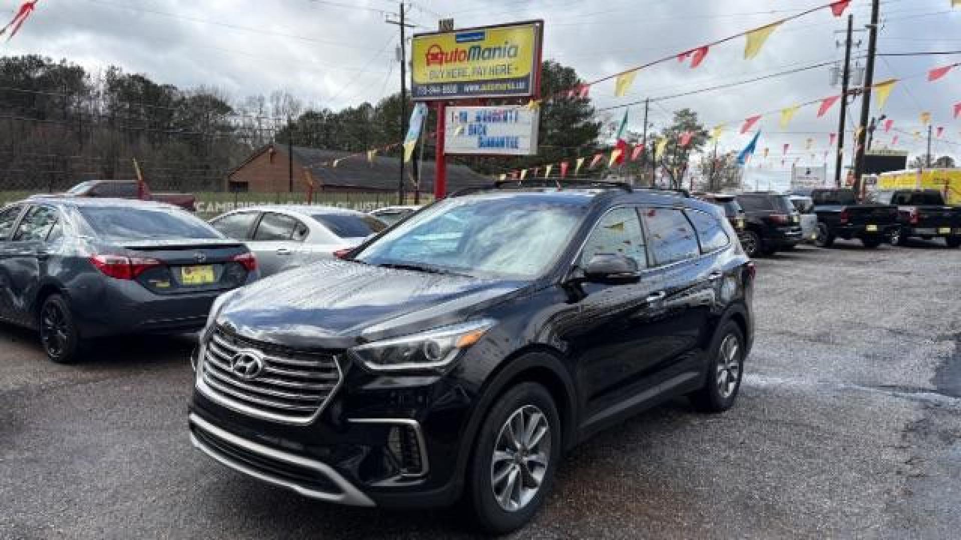 2018 Black Hyundai Santa Fe SE Ultimate (KM8SN4HF4JU) with an 3.3L V6 DOHC 24V engine, 6-Speed Automatic transmission, located at 1806 Veterans Memorial Hwy SW, Austell, GA, 30168, (770) 944-9558, 33.817959, -84.606987 - Photo#0