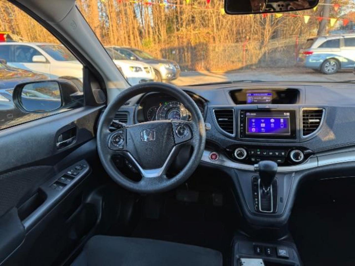 2016 Black Honda CR-V EX AWD (5J6RM4H54GL) with an 2.4L L4 DOHC 16V engine, Continuously Variable Transmission transmission, located at 1806 Veterans Memorial Hwy SW, Austell, GA, 30168, (770) 944-9558, 33.817959, -84.606987 - Photo#12