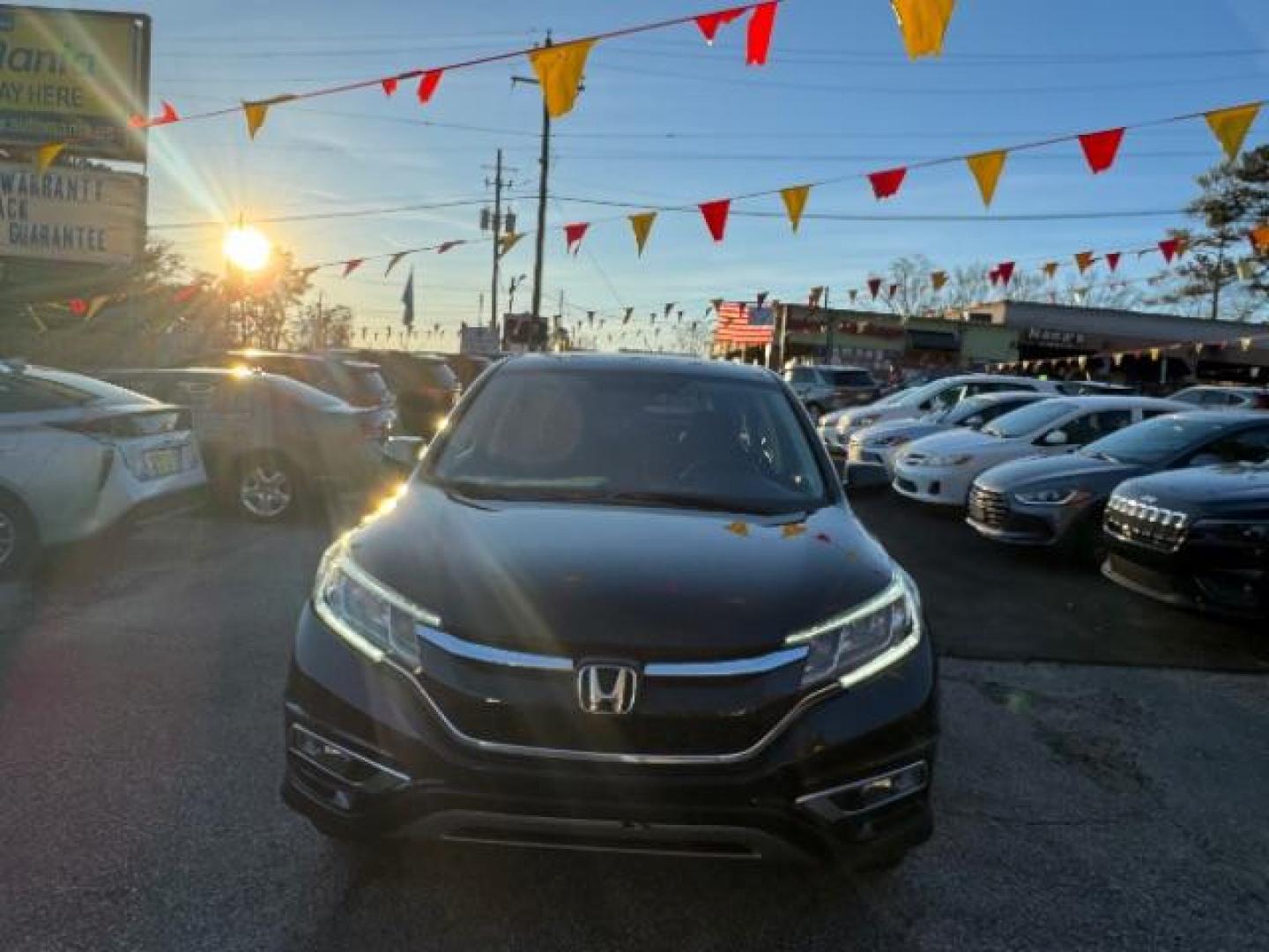 2016 Black Honda CR-V EX AWD (5J6RM4H54GL) with an 2.4L L4 DOHC 16V engine, Continuously Variable Transmission transmission, located at 1806 Veterans Memorial Hwy SW, Austell, GA, 30168, (770) 944-9558, 33.817959, -84.606987 - Photo#1