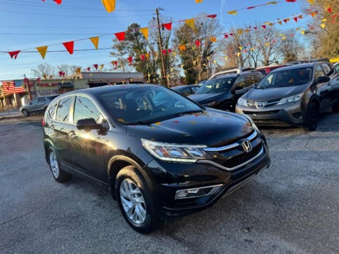 2016 Black Honda CR-V EX AWD (5J6RM4H54GL) with an 2.4L L4 DOHC 16V engine, Continuously Variable Transmission transmission, located at 1806 Veterans Memorial Hwy SW, Austell, GA, 30168, (770) 944-9558, 33.817959, -84.606987 - Photo#2