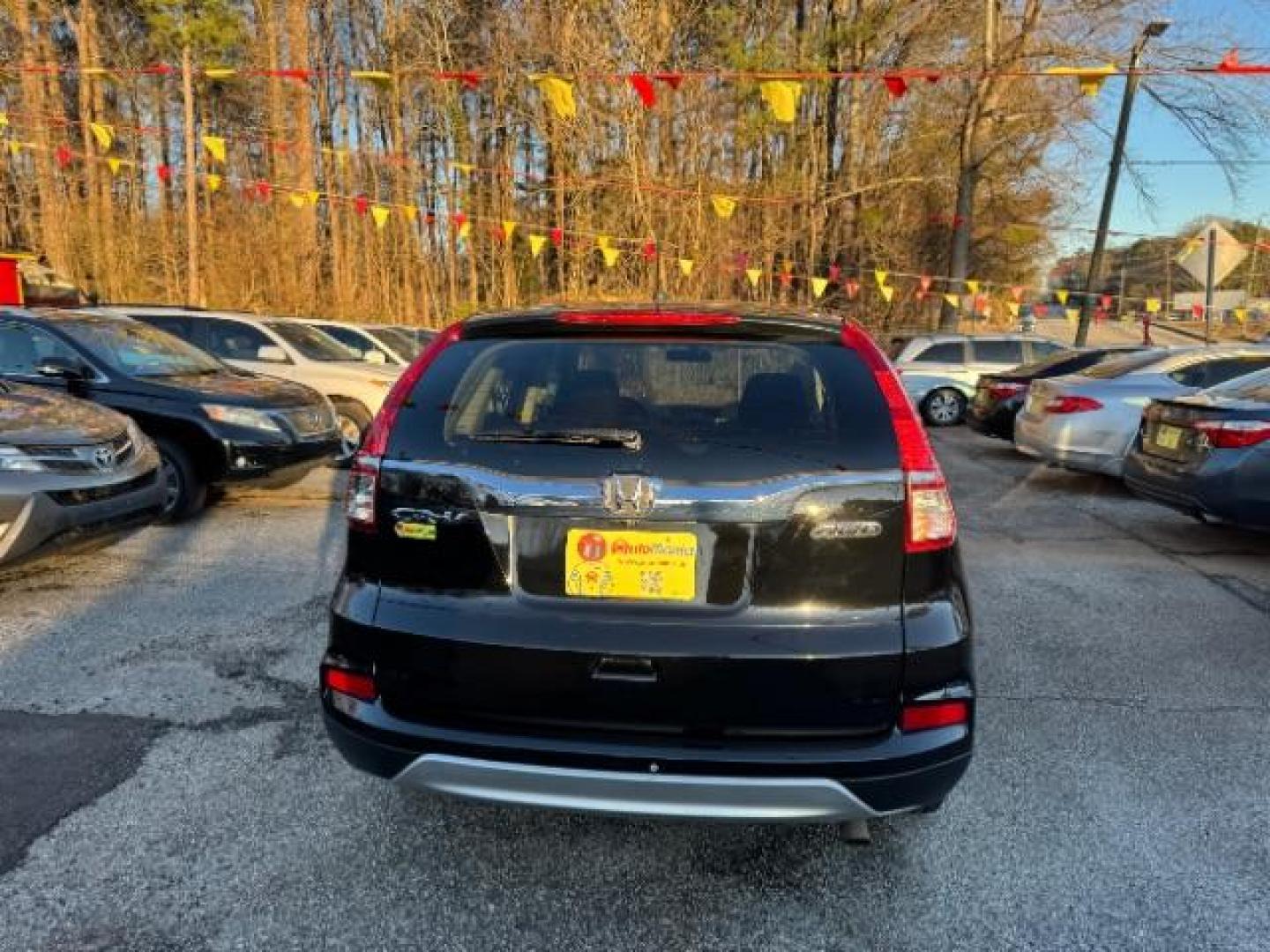 2016 Black Honda CR-V EX AWD (5J6RM4H54GL) with an 2.4L L4 DOHC 16V engine, Continuously Variable Transmission transmission, located at 1806 Veterans Memorial Hwy SW, Austell, GA, 30168, (770) 944-9558, 33.817959, -84.606987 - Photo#4