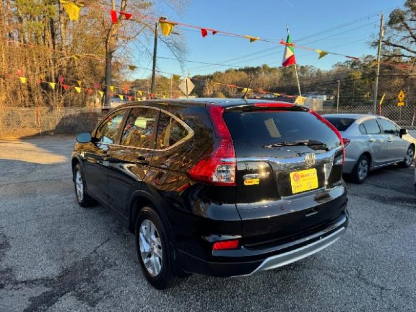 2016 Black Honda CR-V EX AWD (5J6RM4H54GL) with an 2.4L L4 DOHC 16V engine, Continuously Variable Transmission transmission, located at 1806 Veterans Memorial Hwy SW, Austell, GA, 30168, (770) 944-9558, 33.817959, -84.606987 - Photo#5