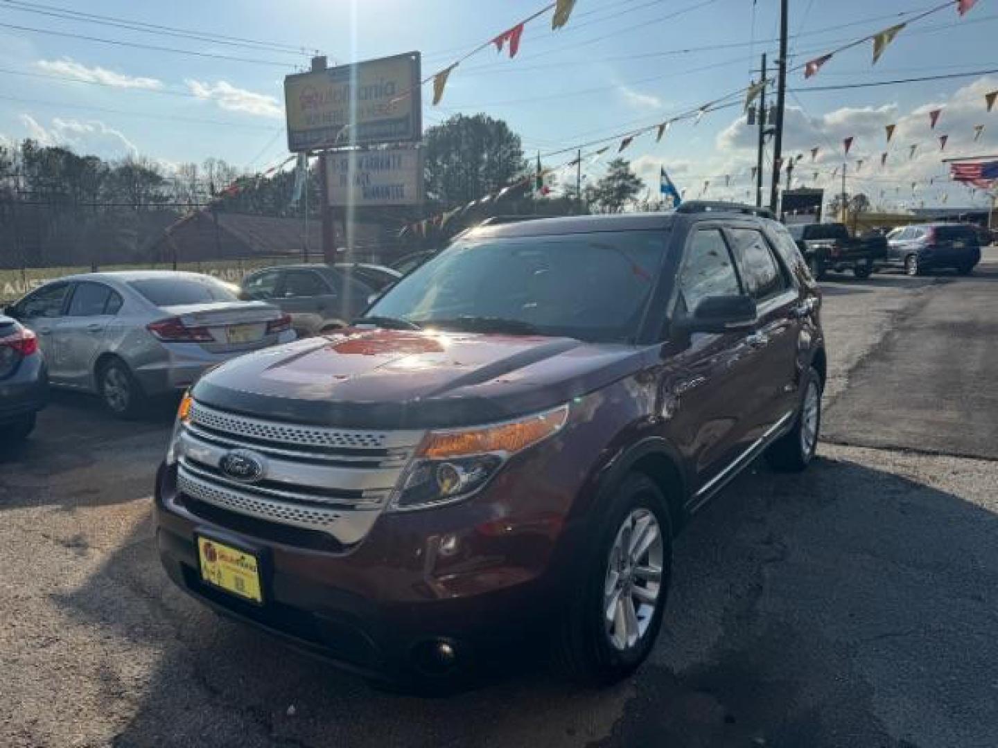 2015 Maroon Ford Explorer XLT 4WD (1FM5K8D80FG) with an 3.5L V6 DOHC 24V engine, 6-Speed Automatic transmission, located at 1806 Veterans Memorial Hwy SW, Austell, GA, 30168, (770) 944-9558, 33.817959, -84.606987 - Photo#0