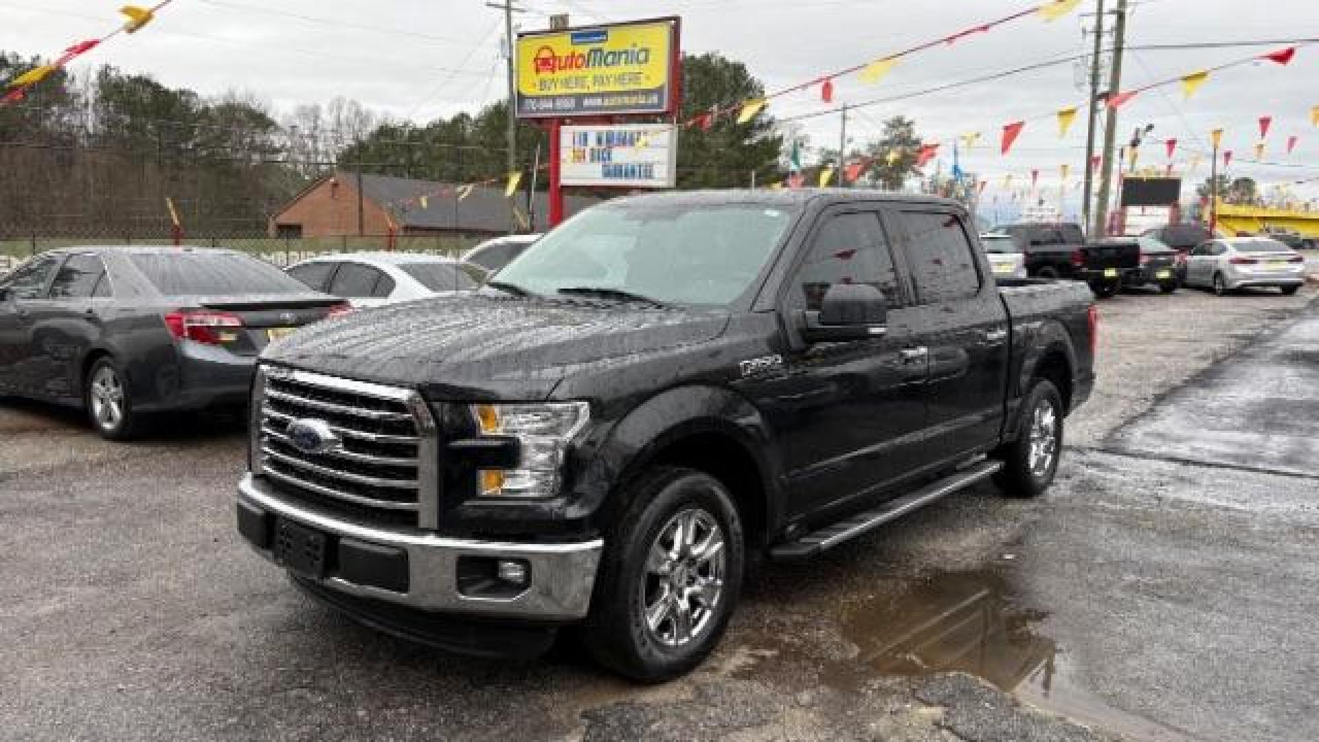 2015 Black Ford F-150 XLT SuperCrew 6.5-ft. Bed 2WD (1FTEW1CPXFF) with an 2.7L V6 DOHC 24V engine, 6-Speed Automatic transmission, located at 1806 Veterans Memorial Hwy SW, Austell, GA, 30168, (770) 944-9558, 33.817959, -84.606987 - Photo#0