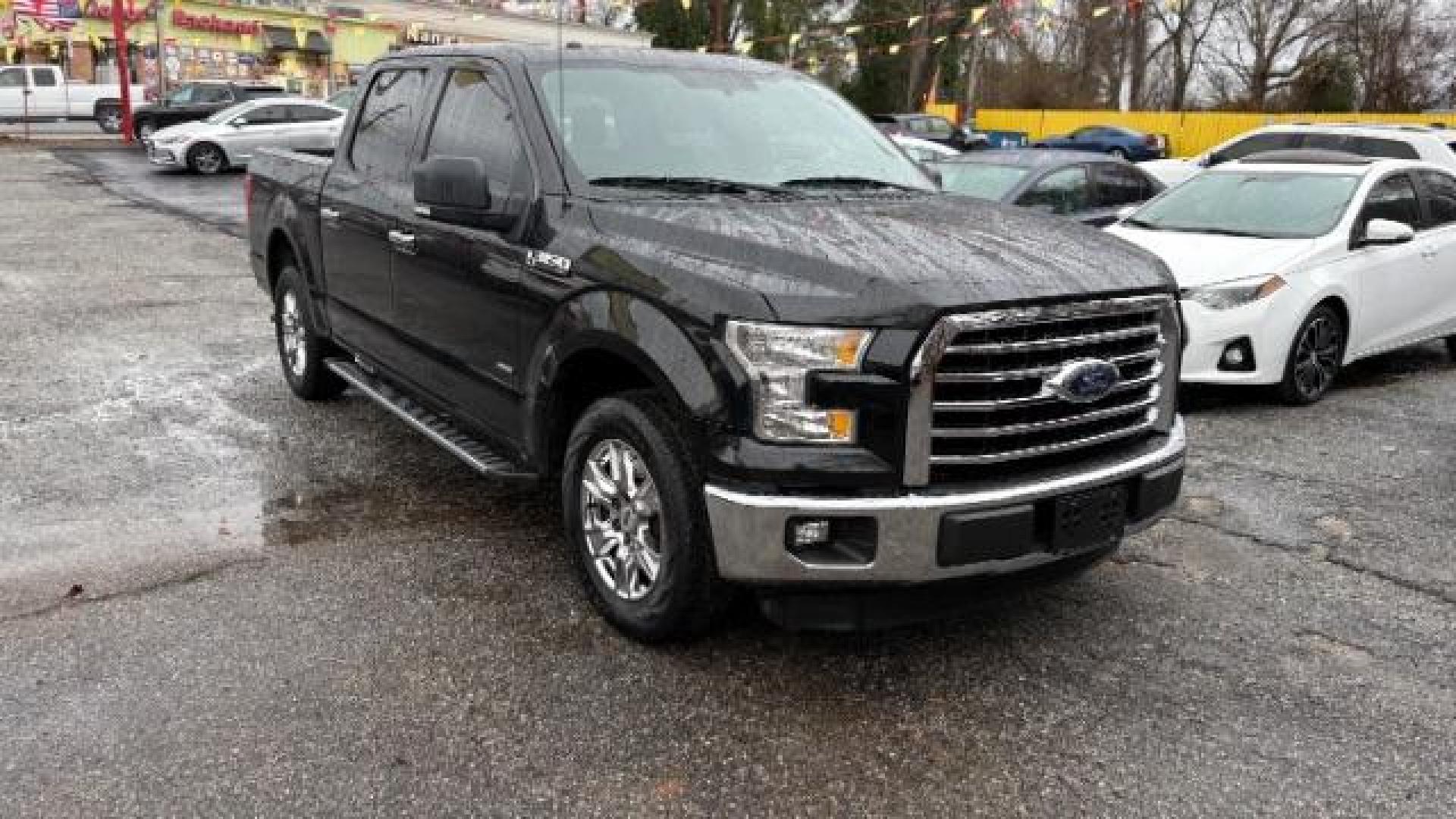 2015 Black Ford F-150 XLT SuperCrew 6.5-ft. Bed 2WD (1FTEW1CPXFF) with an 2.7L V6 DOHC 24V engine, 6-Speed Automatic transmission, located at 1806 Veterans Memorial Hwy SW, Austell, GA, 30168, (770) 944-9558, 33.817959, -84.606987 - Photo#2