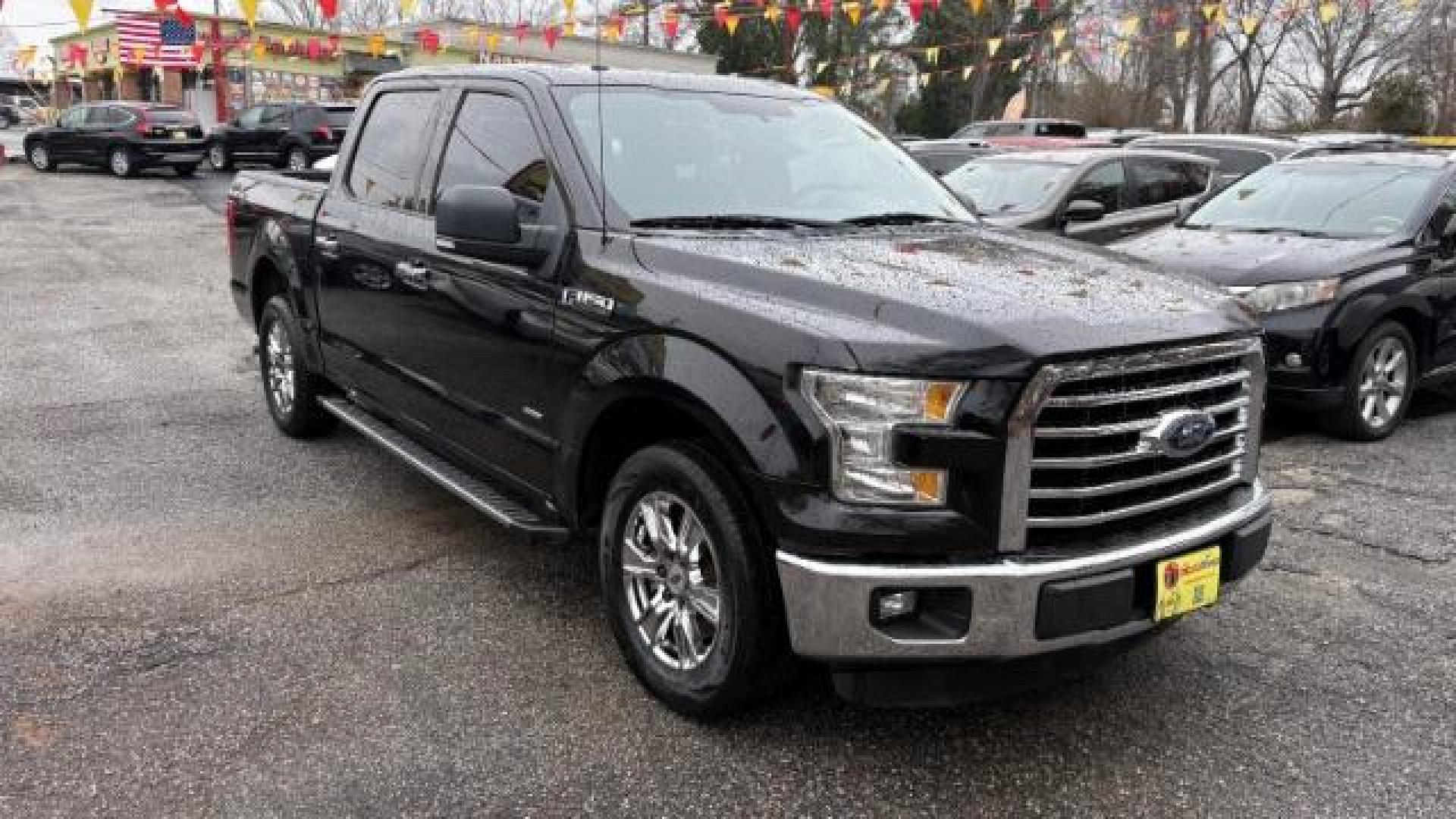 2015 Black Ford F-150 XLT SuperCrew 6.5-ft. Bed 2WD (1FTEW1CPXFF) with an 2.7L V6 DOHC 24V engine, 6-Speed Automatic transmission, located at 1806 Veterans Memorial Hwy SW, Austell, GA, 30168, (770) 944-9558, 33.817959, -84.606987 - Photo#22