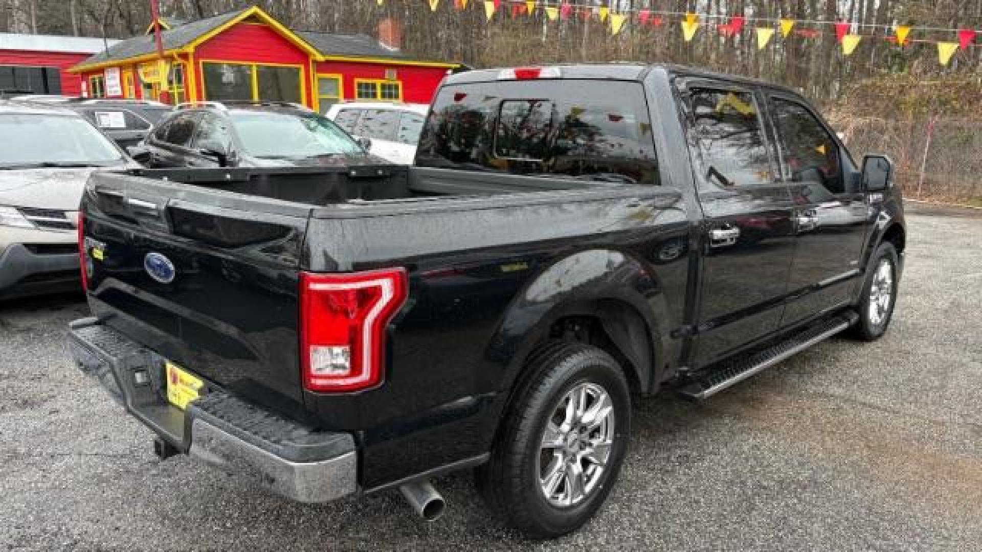 2015 Black Ford F-150 XLT SuperCrew 6.5-ft. Bed 2WD (1FTEW1CPXFF) with an 2.7L V6 DOHC 24V engine, 6-Speed Automatic transmission, located at 1806 Veterans Memorial Hwy SW, Austell, GA, 30168, (770) 944-9558, 33.817959, -84.606987 - Photo#23