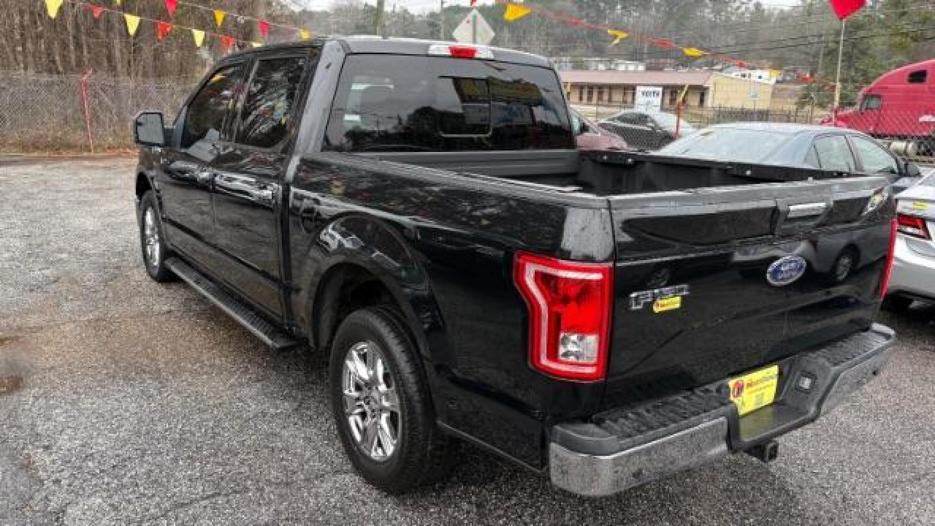 2015 Black Ford F-150 XLT SuperCrew 6.5-ft. Bed 2WD (1FTEW1CPXFF) with an 2.7L V6 DOHC 24V engine, 6-Speed Automatic transmission, located at 1806 Veterans Memorial Hwy SW, Austell, GA, 30168, (770) 944-9558, 33.817959, -84.606987 - Photo#24