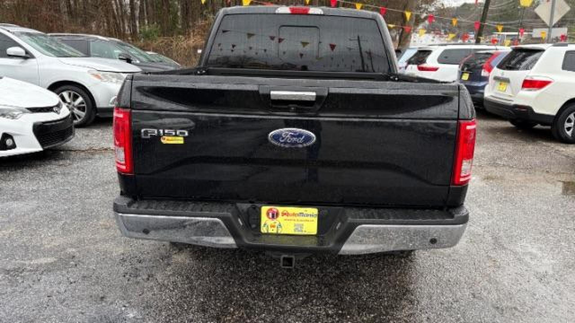 2015 Black Ford F-150 XLT SuperCrew 6.5-ft. Bed 2WD (1FTEW1CPXFF) with an 2.7L V6 DOHC 24V engine, 6-Speed Automatic transmission, located at 1806 Veterans Memorial Hwy SW, Austell, GA, 30168, (770) 944-9558, 33.817959, -84.606987 - Photo#4