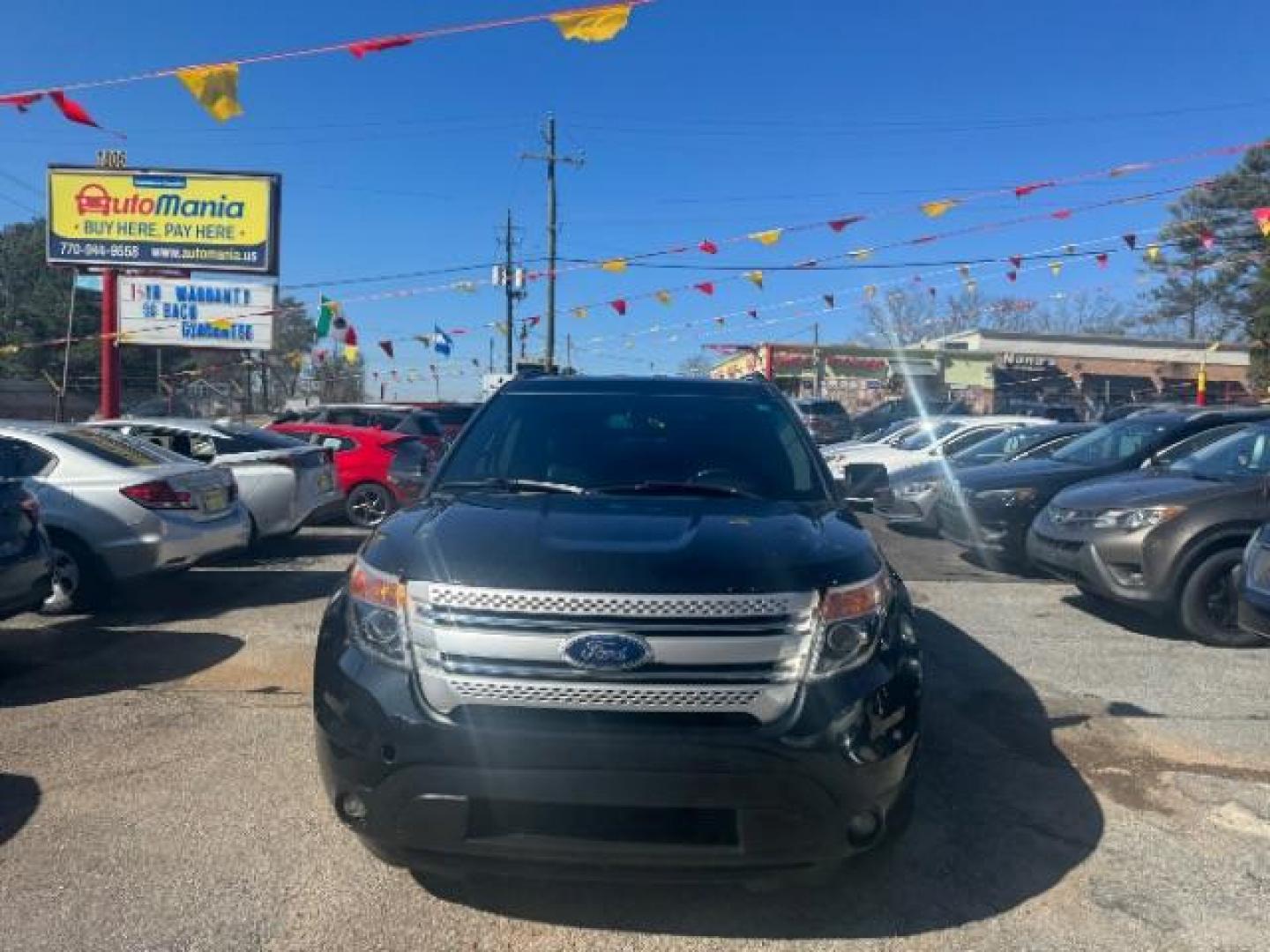 2013 Black Ford Explorer XLT (1FM5K7D87DG) with an 3.5L V-6 DOHC engine, located at 1806 Veterans Memorial Hwy SW, Austell, GA, 30168, (770) 944-9558, 33.817959, -84.606987 - Photo#2