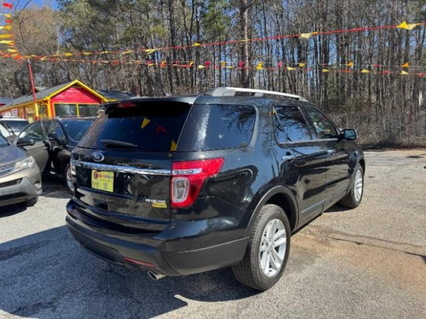 2013 Black Ford Explorer XLT (1FM5K7D87DG) with an 3.5L V-6 DOHC engine, located at 1806 Veterans Memorial Hwy SW, Austell, GA, 30168, (770) 944-9558, 33.817959, -84.606987 - Photo#4