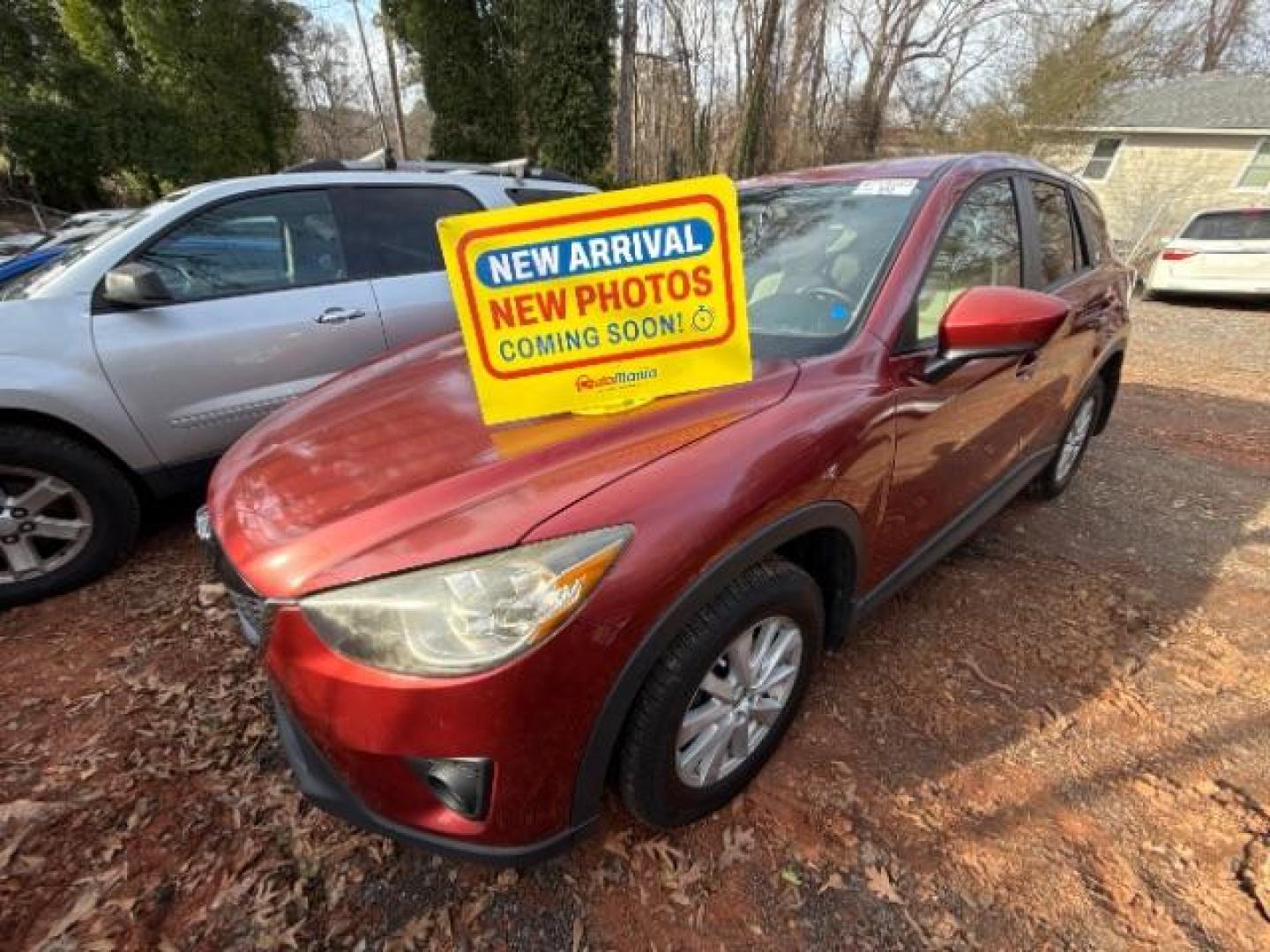 2013 Red Mazda CX-5 Touring (JM3KE2CE5D0) , located at 1806 Veterans Memorial Hwy SW, Austell, GA, 30168, (770) 944-9558, 33.817959, -84.606987 - Photo#0