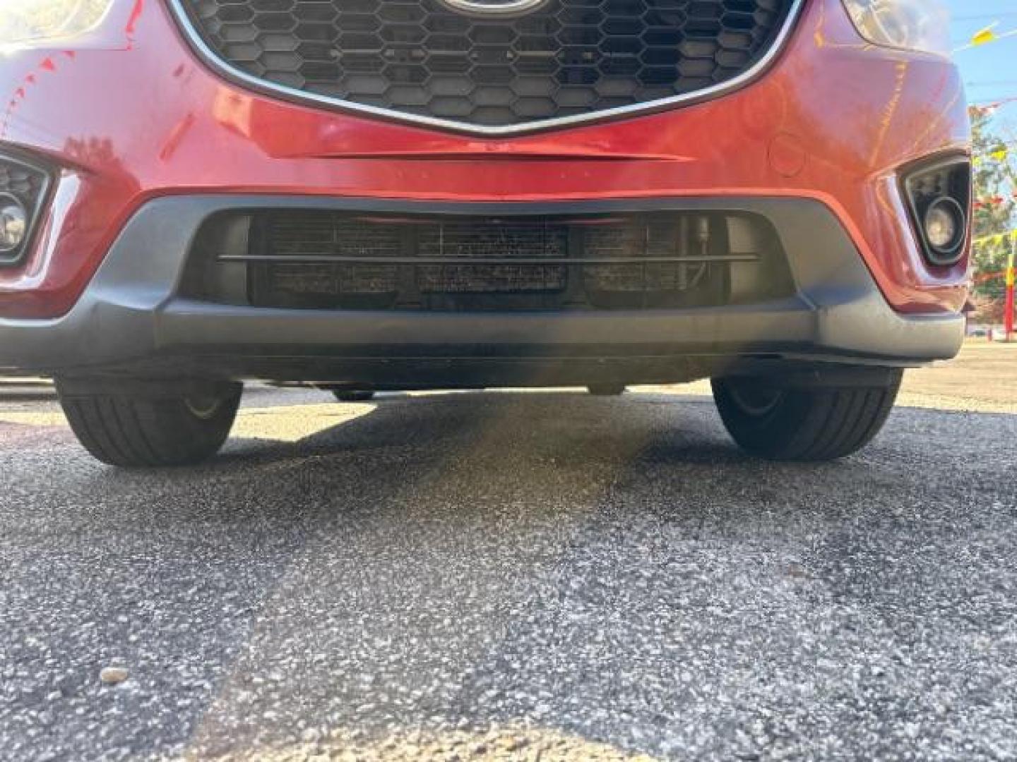 2013 Red Mazda CX-5 Touring (JM3KE2CE5D0) with an SKYACTIV-G 2L I-4 gasoline direct injection engine, located at 1806 Veterans Memorial Hwy SW, Austell, GA, 30168, (770) 944-9558, 33.817959, -84.606987 - Photo#13