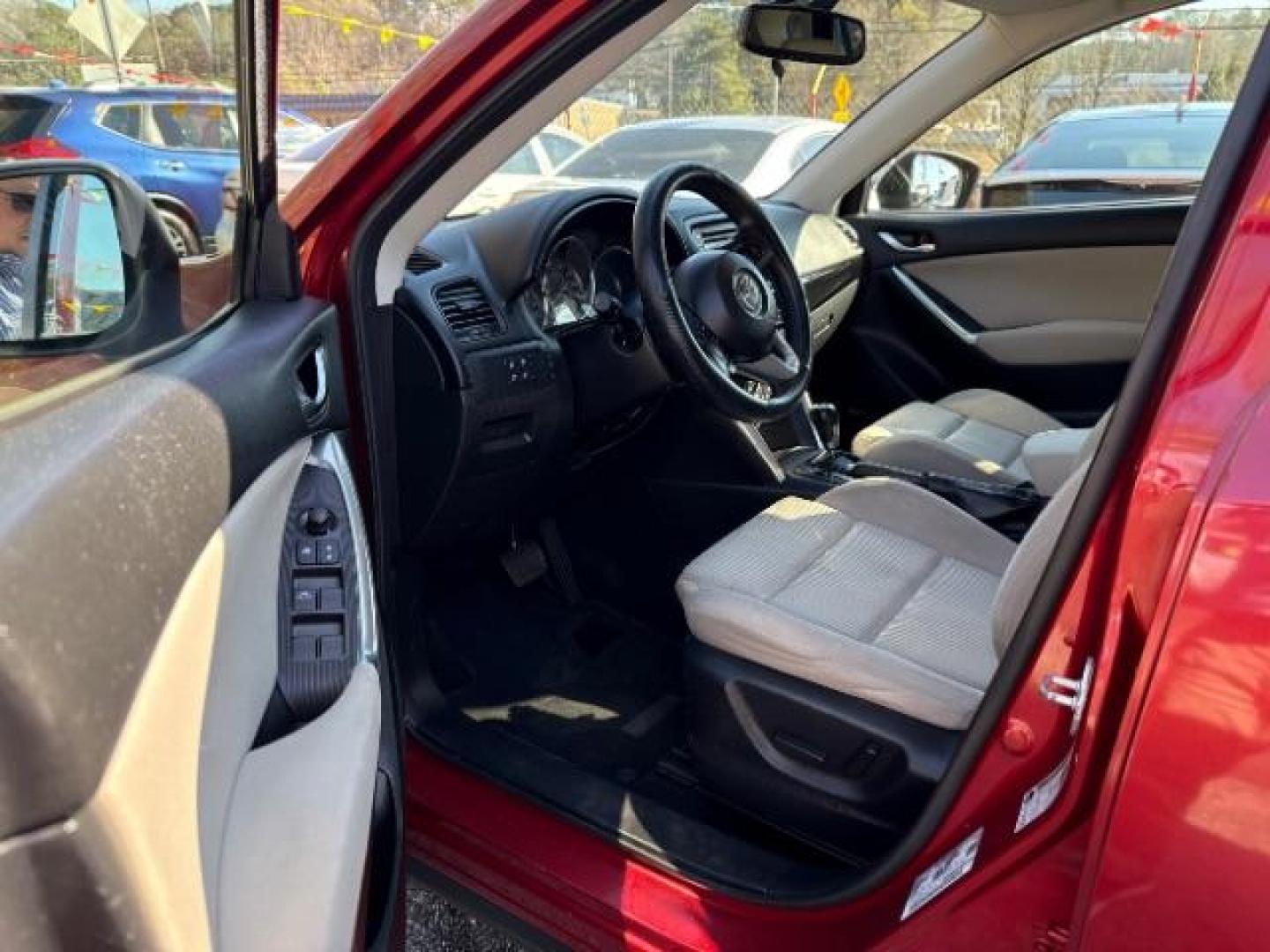 2013 Red Mazda CX-5 Touring (JM3KE2CE5D0) with an SKYACTIV-G 2L I-4 gasoline direct injection engine, located at 1806 Veterans Memorial Hwy SW, Austell, GA, 30168, (770) 944-9558, 33.817959, -84.606987 - Photo#14