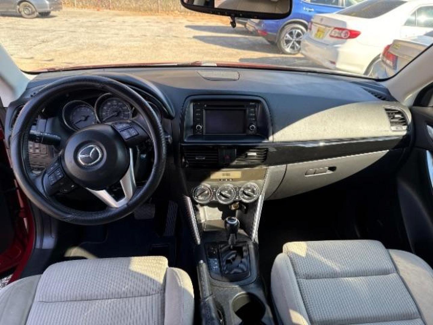 2013 Red Mazda CX-5 Touring (JM3KE2CE5D0) with an SKYACTIV-G 2L I-4 gasoline direct injection engine, located at 1806 Veterans Memorial Hwy SW, Austell, GA, 30168, (770) 944-9558, 33.817959, -84.606987 - Photo#16