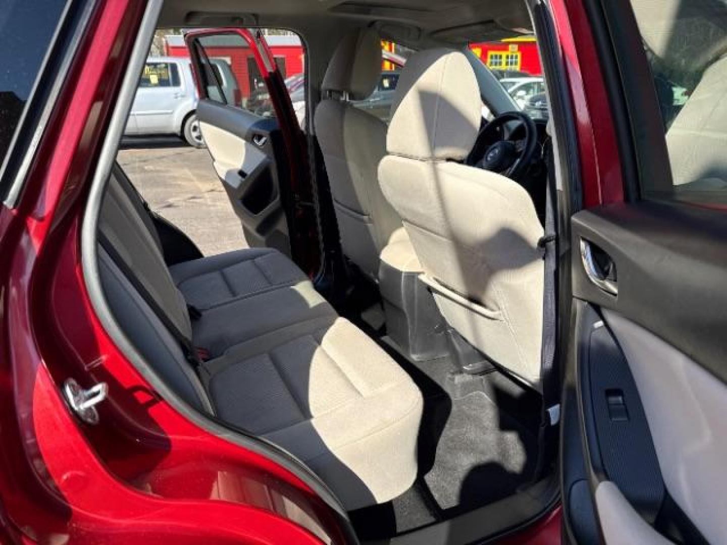 2013 Red Mazda CX-5 Touring (JM3KE2CE5D0) with an SKYACTIV-G 2L I-4 gasoline direct injection engine, located at 1806 Veterans Memorial Hwy SW, Austell, GA, 30168, (770) 944-9558, 33.817959, -84.606987 - Photo#19