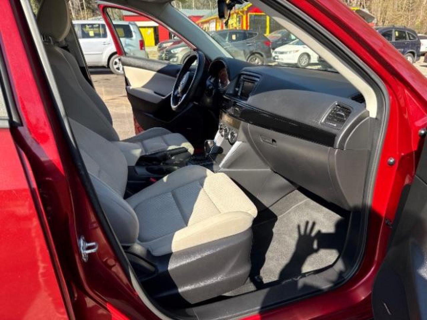 2013 Red Mazda CX-5 Touring (JM3KE2CE5D0) with an SKYACTIV-G 2L I-4 gasoline direct injection engine, located at 1806 Veterans Memorial Hwy SW, Austell, GA, 30168, (770) 944-9558, 33.817959, -84.606987 - Photo#20