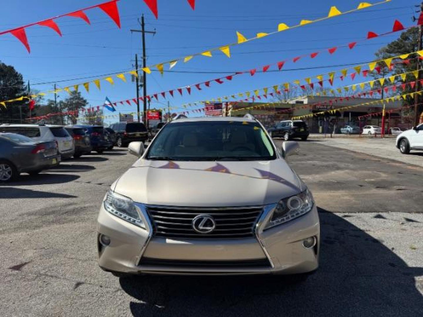 2013 Gold Lexus RX 350 BASE (2T2ZK1BAXDC) with an 3.5L V6 SFI DOHC engine, located at 1806 Veterans Memorial Hwy SW, Austell, GA, 30168, (770) 944-9558, 33.817959, -84.606987 - Photo#0