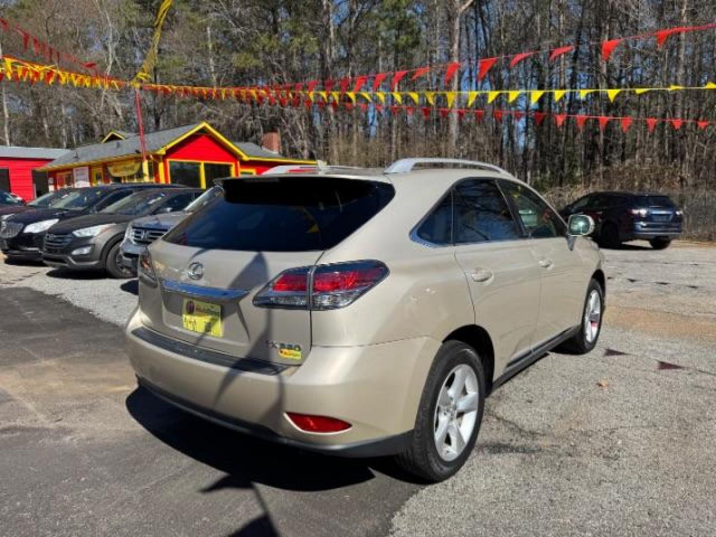 2013 Gold Lexus RX 350 BASE (2T2ZK1BAXDC) with an 3.5L V6 SFI DOHC engine, located at 1806 Veterans Memorial Hwy SW, Austell, GA, 30168, (770) 944-9558, 33.817959, -84.606987 - Photo#3