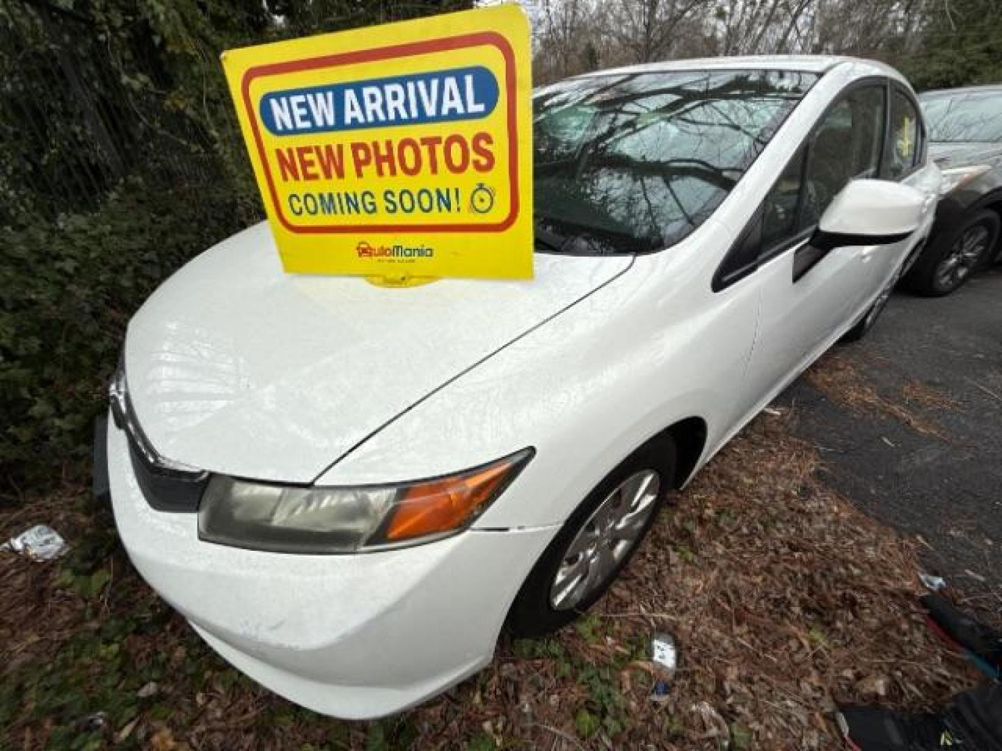 2012 White Honda Civic LX (2HGFB2F59CH) with an 1.8L I-4 MPI SOHC engine, located at 1806 Veterans Memorial Hwy SW, Austell, GA, 30168, (770) 944-9558, 33.817959, -84.606987 - Photo#0