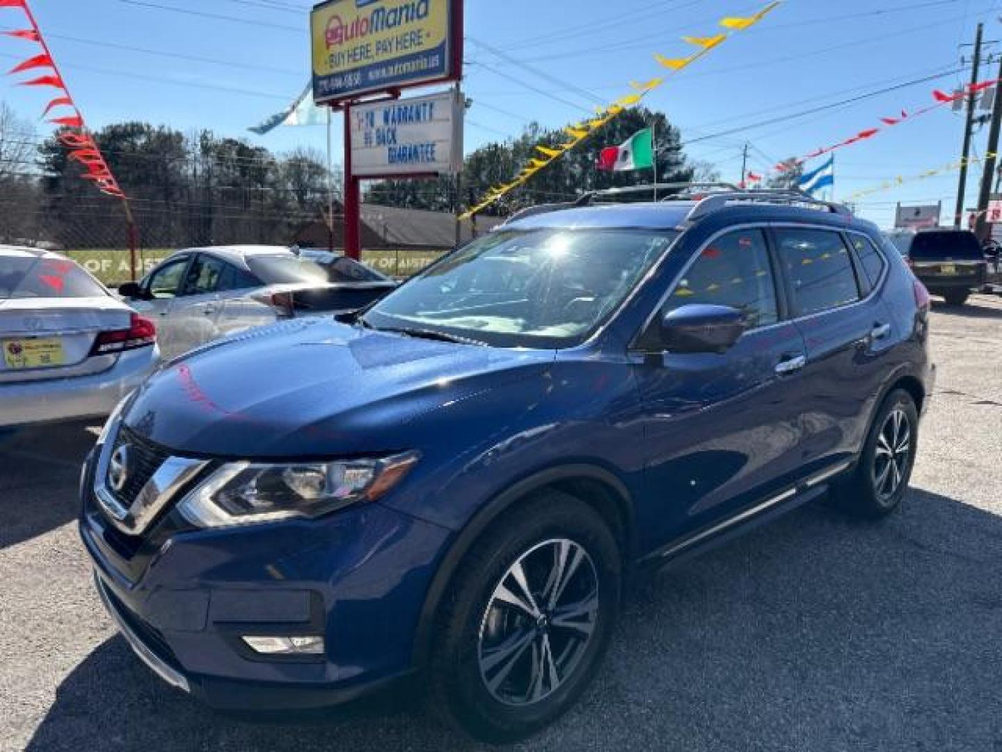 2017 Blue Nissan Rogue S (JN8AT2MT6HW) with an 2.5L I-4 MPI DOHC engine, located at 1806 Veterans Memorial Hwy SW, Austell, GA, 30168, (770) 944-9558, 33.817959, -84.606987 - Photo#0