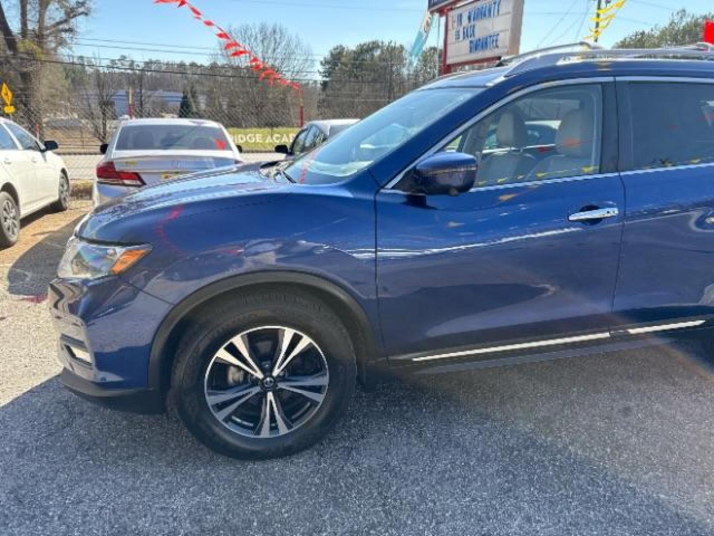 2017 Blue Nissan Rogue S (JN8AT2MT6HW) with an 2.5L I-4 MPI DOHC engine, located at 1806 Veterans Memorial Hwy SW, Austell, GA, 30168, (770) 944-9558, 33.817959, -84.606987 - Photo#1