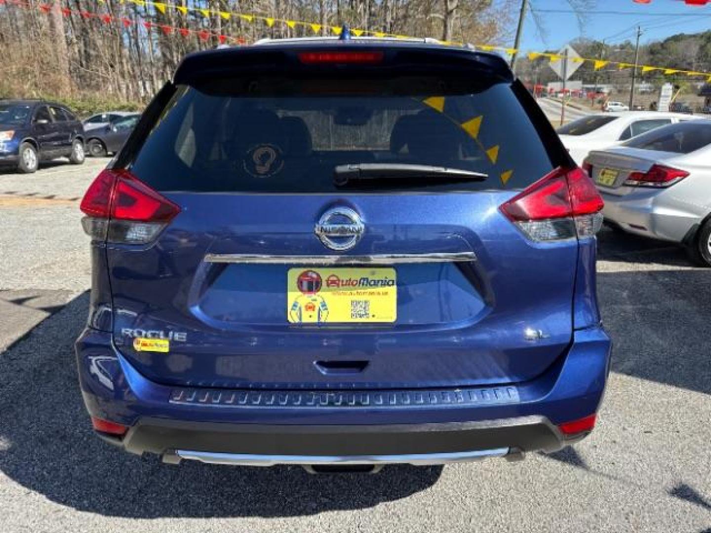 2017 Blue Nissan Rogue S (JN8AT2MT6HW) with an 2.5L I-4 MPI DOHC engine, located at 1806 Veterans Memorial Hwy SW, Austell, GA, 30168, (770) 944-9558, 33.817959, -84.606987 - Photo#4