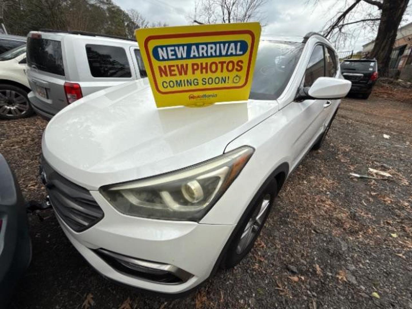 2017 White Hyundai Santa Fe Sport BASE (5NMZU3LB1HH) with an 2.4L I-4 DI DOHC engine, located at 1806 Veterans Memorial Hwy SW, Austell, GA, 30168, (770) 944-9558, 33.817959, -84.606987 - Photo#0