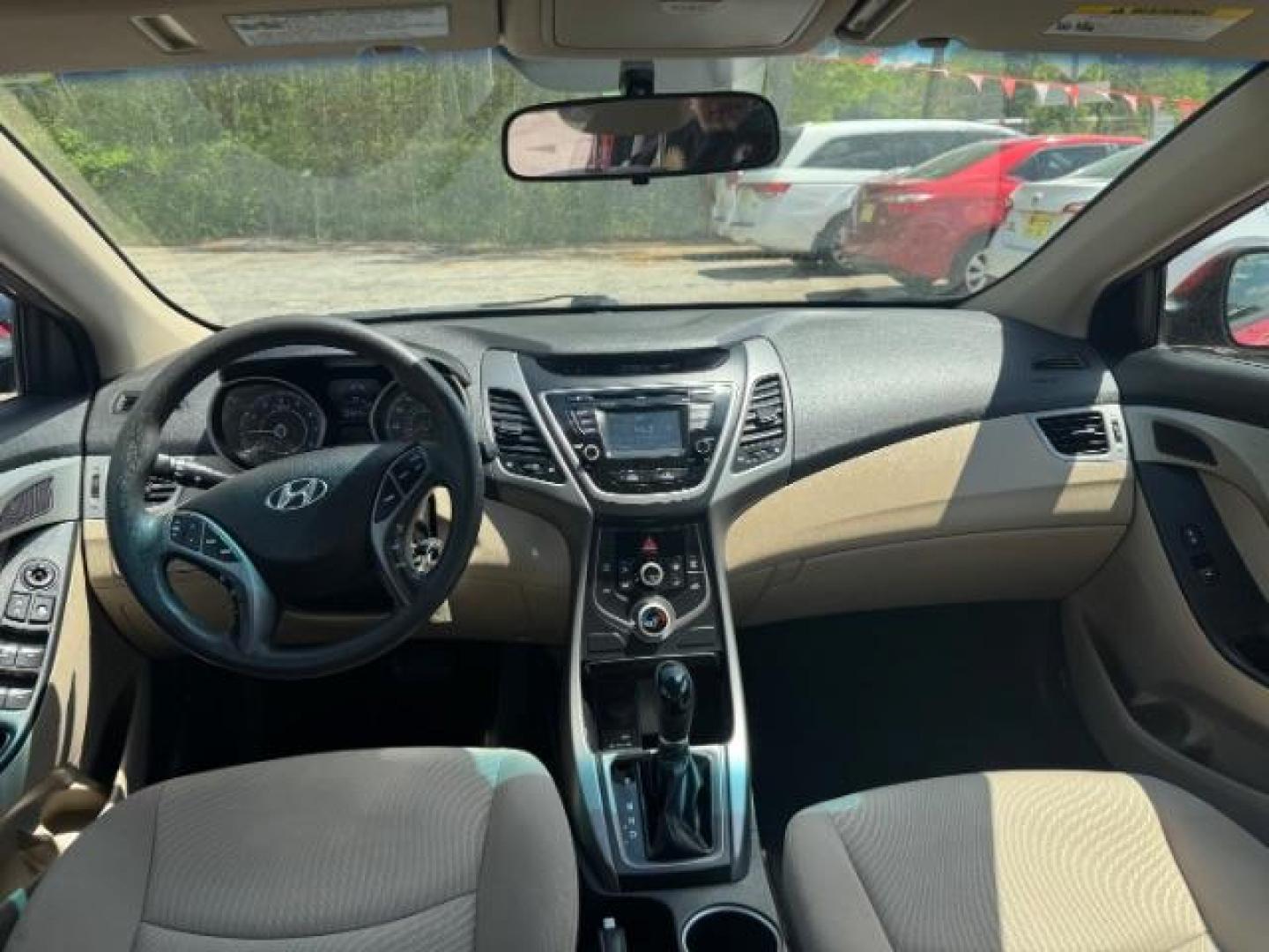 2015 Red Hyundai Elantra SE (KMHDH4AE7FU) with an Nu 1.8L I-4 DOHC engine, located at 1806 Veterans Memorial Hwy SW, Austell, GA, 30168, (770) 944-9558, 33.817959, -84.606987 - Photo#4